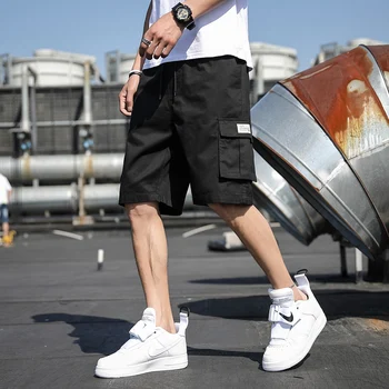 2023 Versão coreana Tendência Casual dos Homens de Moda de Verão Solto Tamanho Capris Moda Multi Bolso de Calça masculina Casual Calças Esportivas